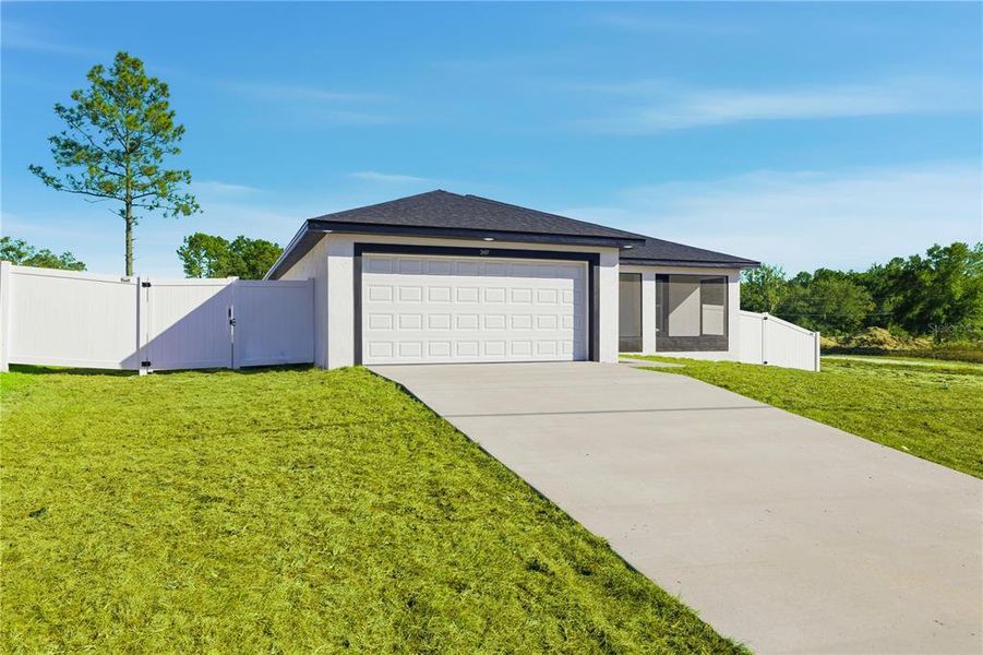 Front exterior of a new home in , Ocala, FL, highlighting curb appeal (Image 17).