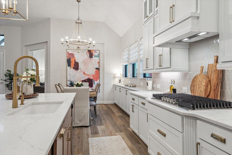 Facing the dining area. Upgraded 5-burner stovetop Facing the dining area. Upgraded 5-burner stovetop