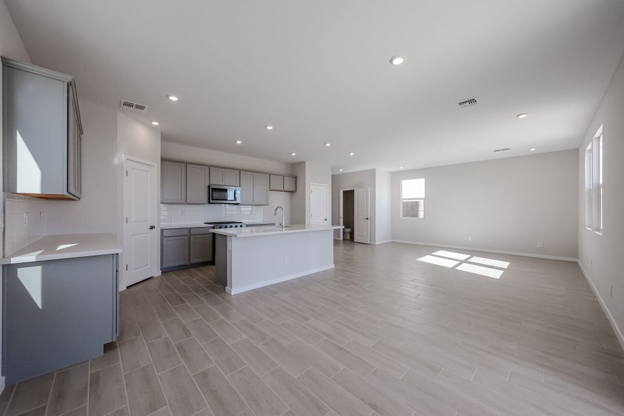 A large empty kitchen. A large empty kitchen.
