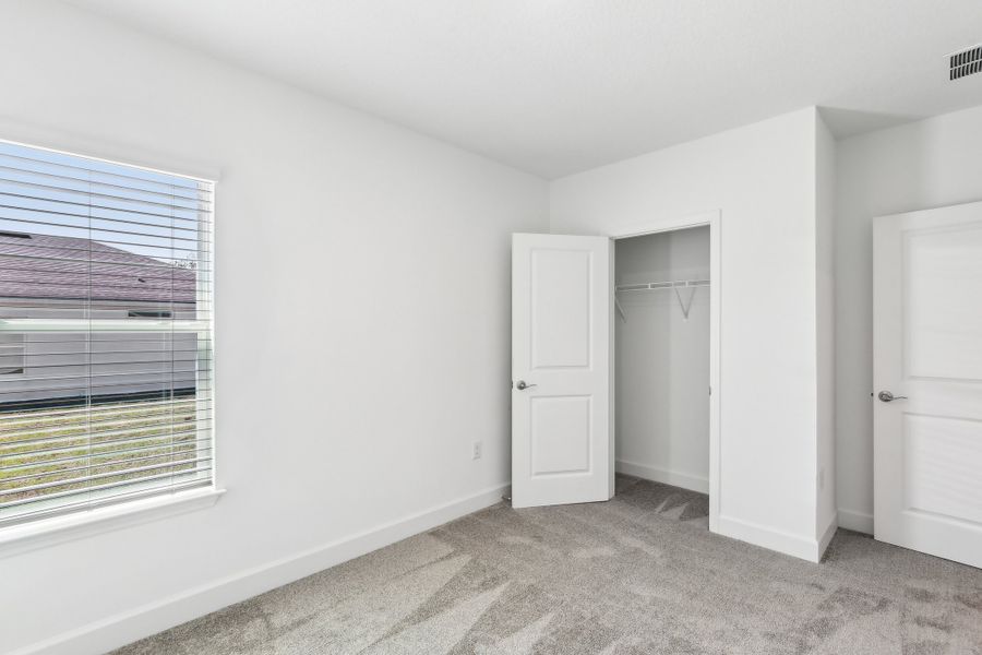 Representative unfurnished interior of a home built from the Landmark II Series - Bonnet II by Brightland Homes in Spring Hill, Spring Hill (Image 21).
