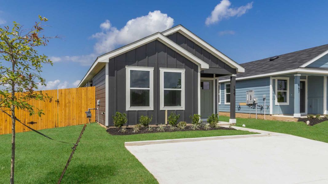 Representative exterior photo of a completed home built from the The Dahlia by D.R. Horton in Marigold, Kyle, TX (Image 12).