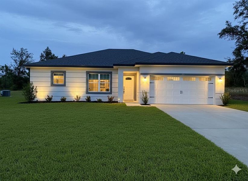 Front exterior of a new home in , Kissimmee, FL, highlighting curb appeal (Image 1). Front exterior of a new home in , Kissimmee, FL, highlighting curb appeal (Image 1).