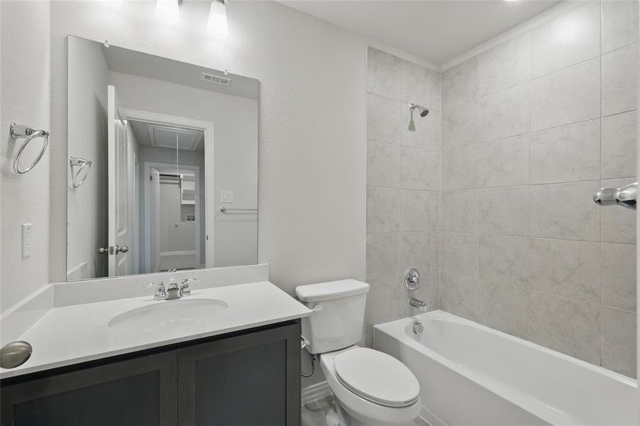 Full bathroom with bathtub / shower combination and vanity