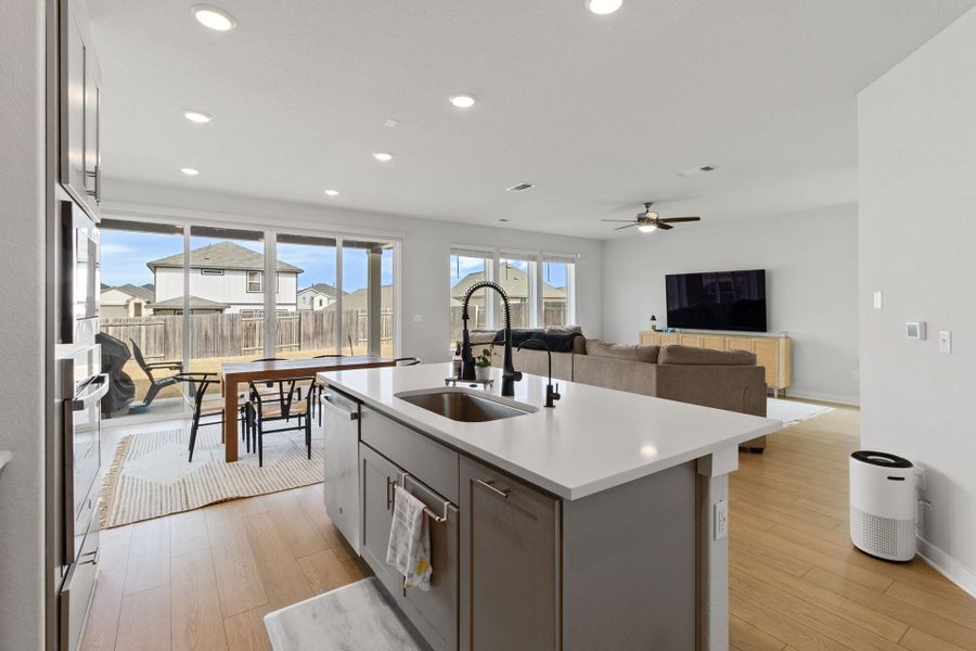 Kitchen featuring  open concept living, breakfast bar