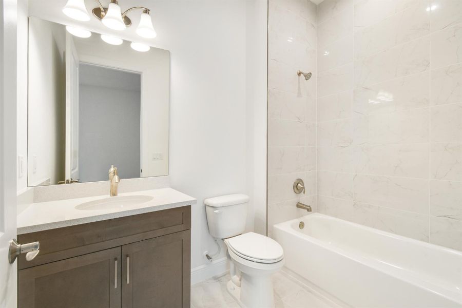 Furnished interior view inside a new home in PGA Village Verano, Port St. Lucie (Image 4).