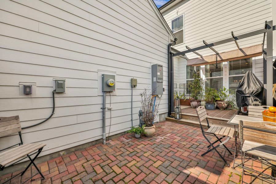 Exterior details and patio area of a home in Homecoming, Ravenel (Image 25). Exterior details and patio area of a home in Homecoming, Ravenel (Image 25).