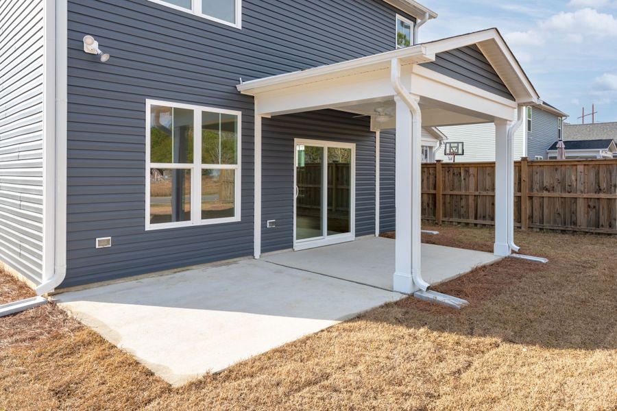 Exterior details and patio area of a home in River Tide Farms, Bolivia (Image 2). Exterior details and patio area of a home in River Tide Farms, Bolivia (Image 2).