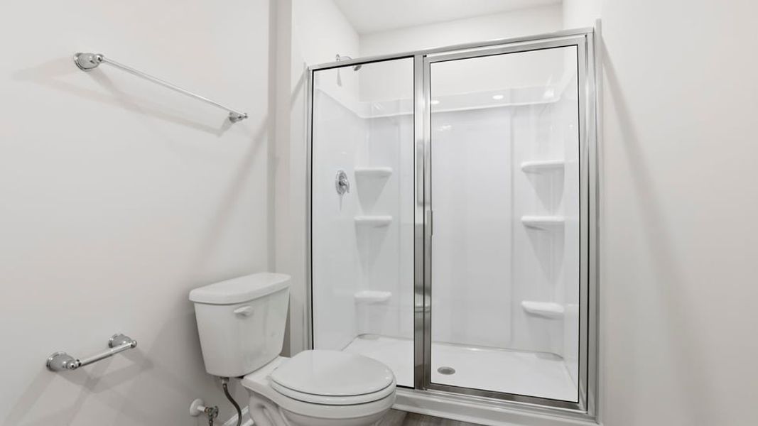 Furnished interior view inside a new home in Bentley Park, Greenwood (Image 11).