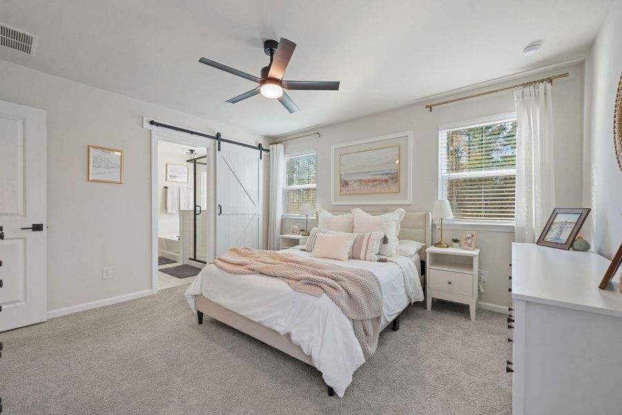 Furnished interior view inside a new home in Jasmine Point at Lakes of Cane Bay, Summerville (Image 34).
