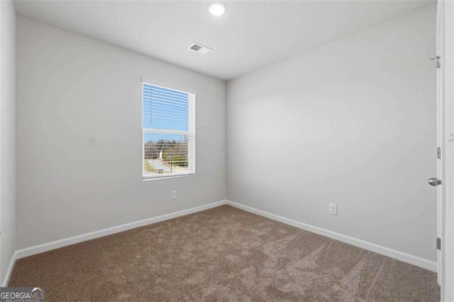 Spacious, unfurnished interior of a new home in The Grove At Mundy Mill, Gainesville (Image 17).