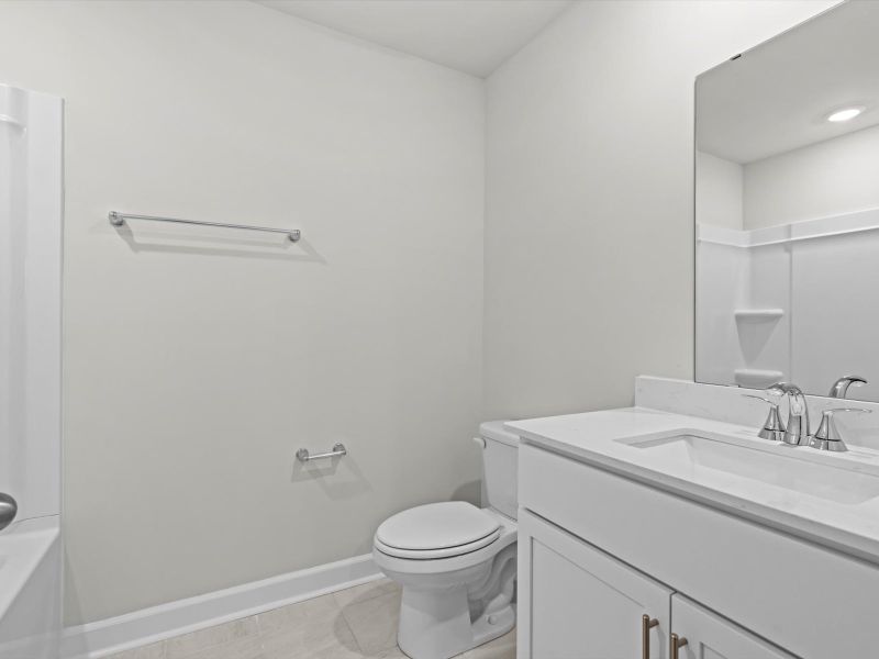 Furnished interior view inside a new home in Crossing at Abner Creek Townes, Greer (Image 9).