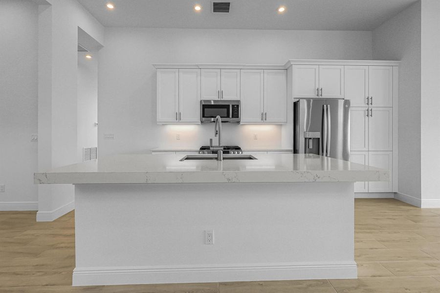 Furnished interior view inside a new home in Rivella, Port St. Lucie (Image 4).