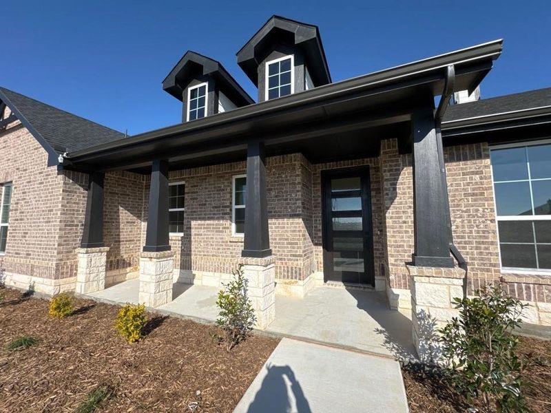 Exterior details and patio area of a home in Fairview Meadows, New Fairview (Image 2).