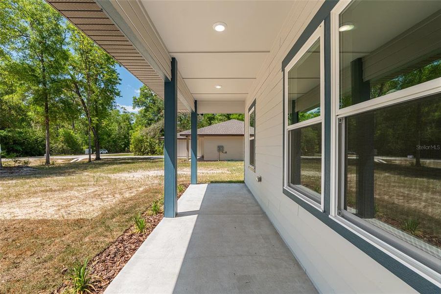 Exterior details and patio area of a home in , Fort White (Image 3).