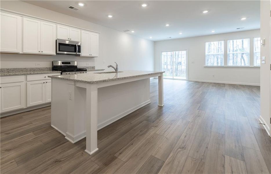 Furnished interior view inside a new home in , Buford (Image 5).