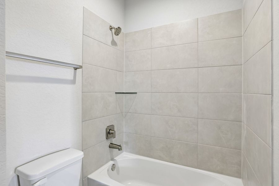 Furnished interior view inside a new home in 6 Creeks, Kyle (Image 14).