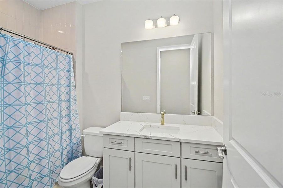 Furnished interior view inside a new home in Cypress Glen at River Wilderness, Parrish (Image 21).
