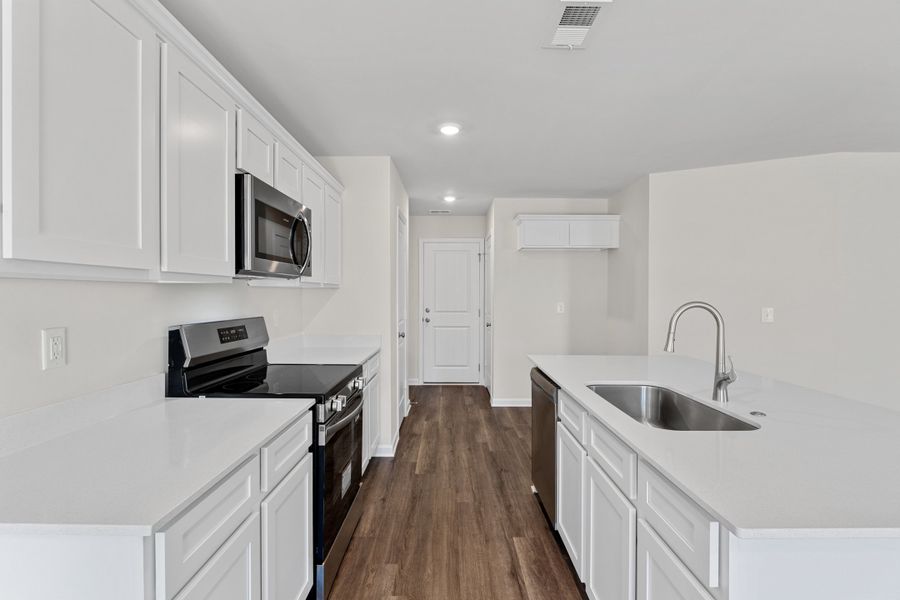 Representative furnished interior of a home built from the Larch Duplex by McGuinn Homes in South Lake Commons, Lexington (Image 4).