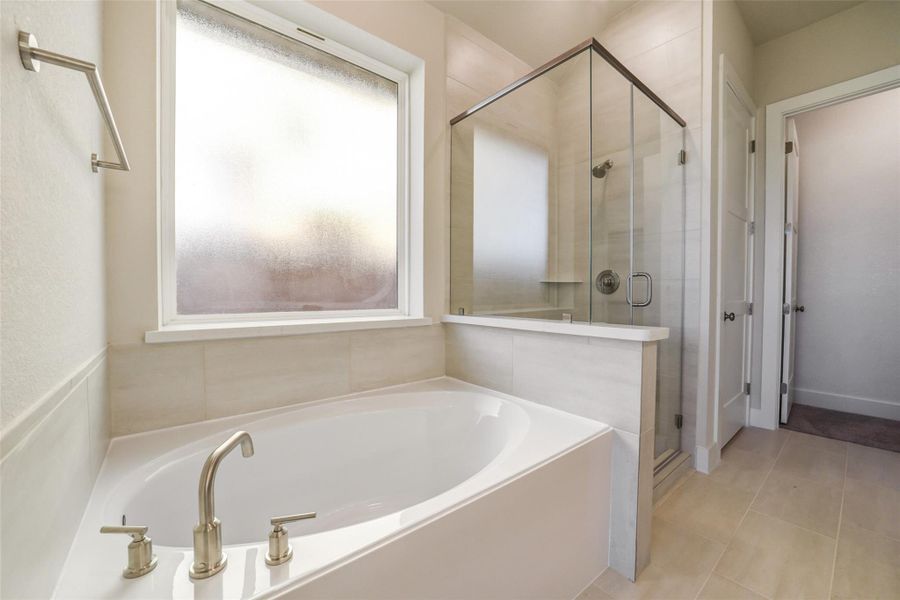 Furnished interior view inside a new home in Sunterra, Katy (Image 13).