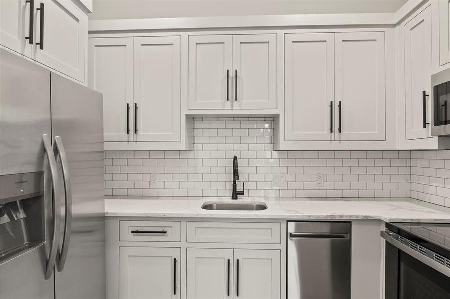 Guest Quarters Full Sized Kitchen w/ Full Appliance Package including dishwasher and stackable wash/dryer Guest Quarters Full Sized Kitchen w/ Full Appliance Package including dishwasher and stackable wash/dryer