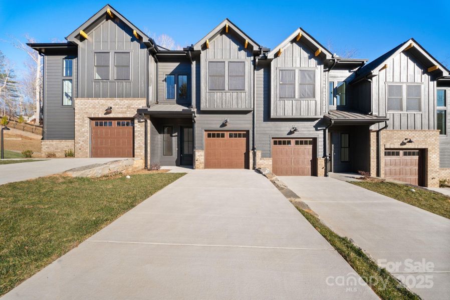 Front exterior of a new home in , Asheville, NC, highlighting curb appeal (Image 1). Front exterior of a new home in , Asheville, NC, highlighting curb appeal (Image 1).