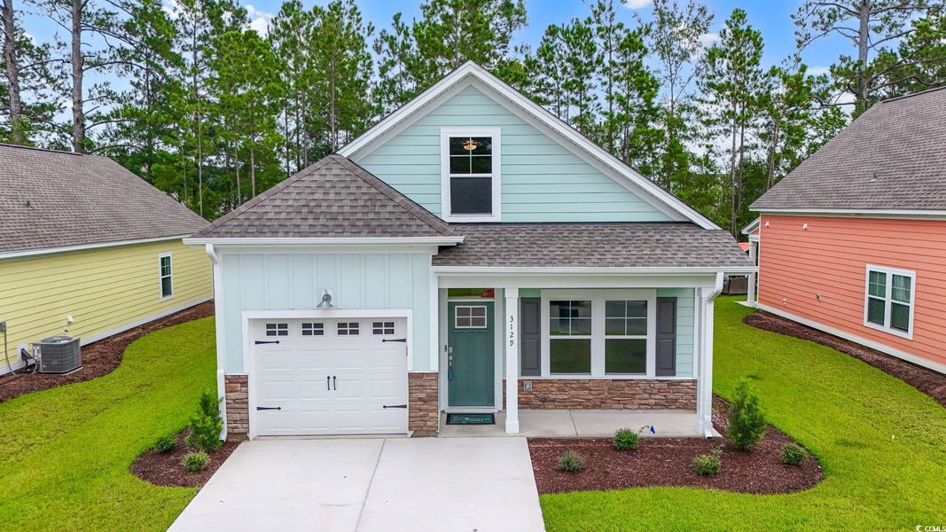 Front exterior of a new home in White Oak Estates, Conway, SC, highlighting curb appeal (Image 1).