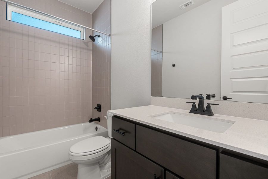 Furnished interior view inside a new home in Lagos Reserve, Manor (Image 5).