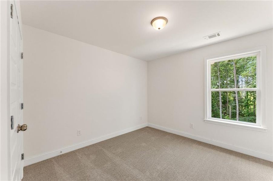 Spacious, unfurnished interior of a new home in Clark Farms, Flowery Branch (Image 26).