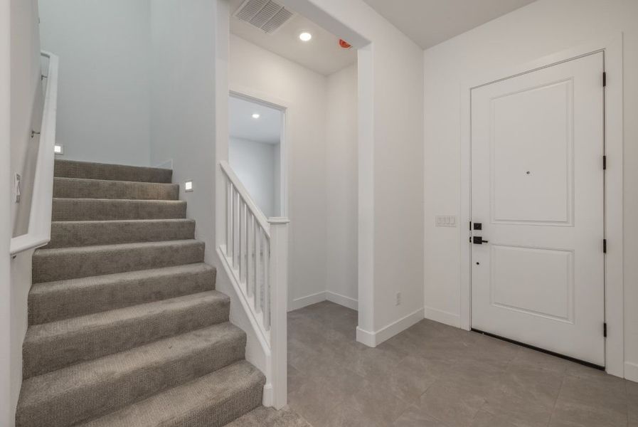 Representative unfurnished interior of a home built from the Ponderosa by William Ryan Homes in Silver Cross, San Tan Valley (Image 26).