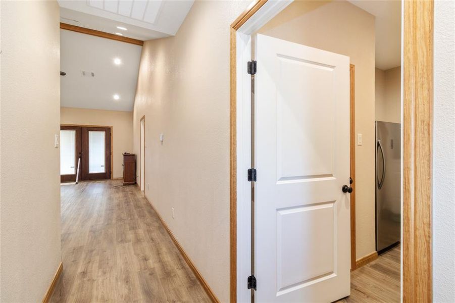 Leads to Living Room or Utility Room
