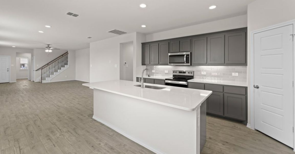 Representative exterior photo of a completed home built from the Willow by Impression Homes in Keeneland, Aubrey, TX (Image 6). Representative exterior photo of a completed home built from the Willow by Impression Homes in Keeneland, Aubrey, TX (Image 6).