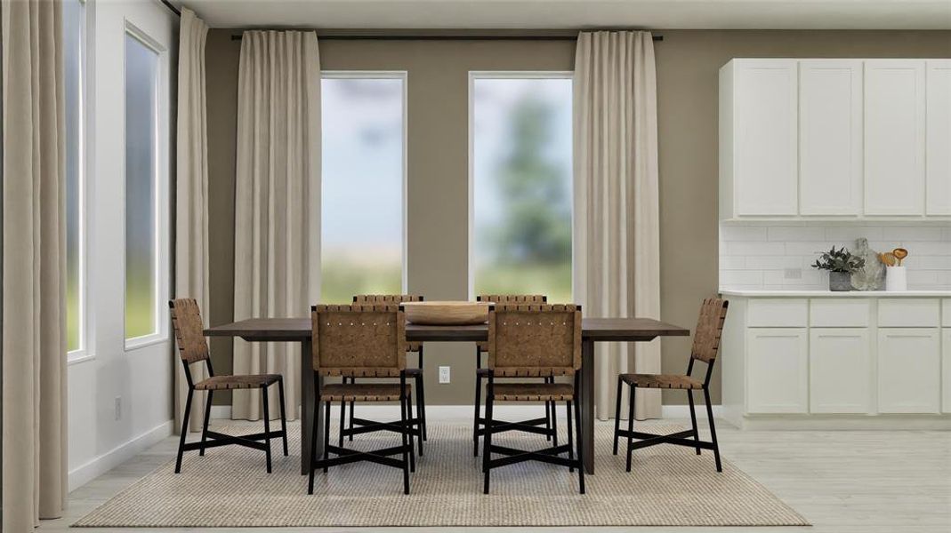 Dining area featuring light wood-type flooring
