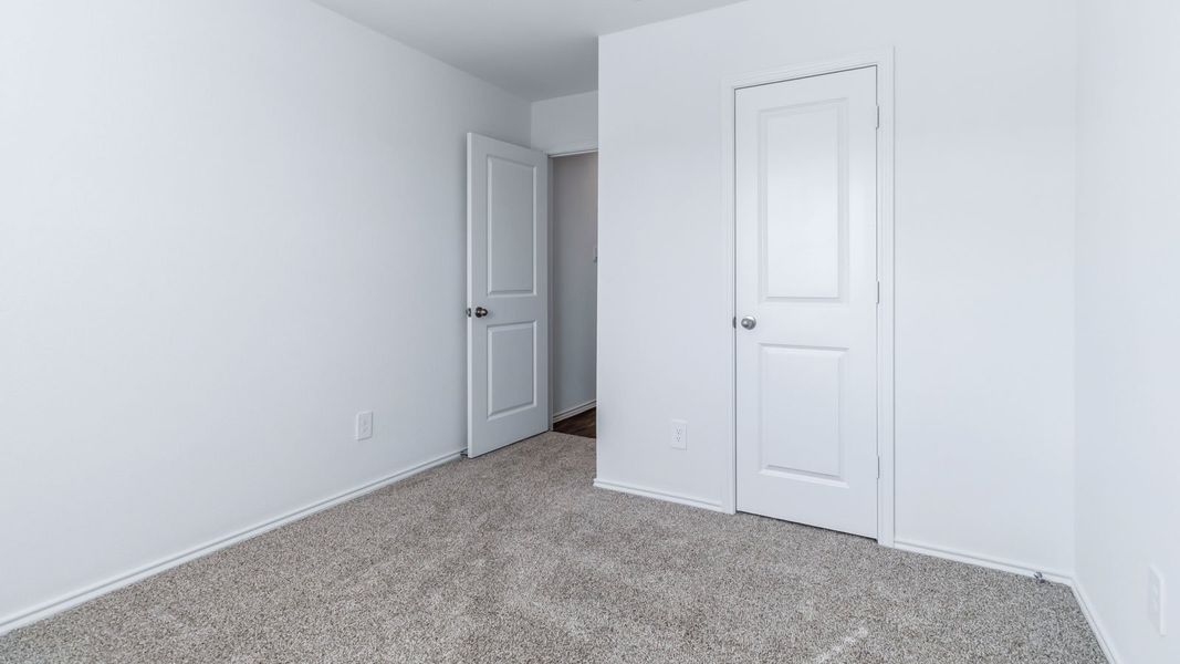 Representative unfurnished interior of a home built from the The Easton by D.R. Horton in Wayside, Uhland (Image 29).