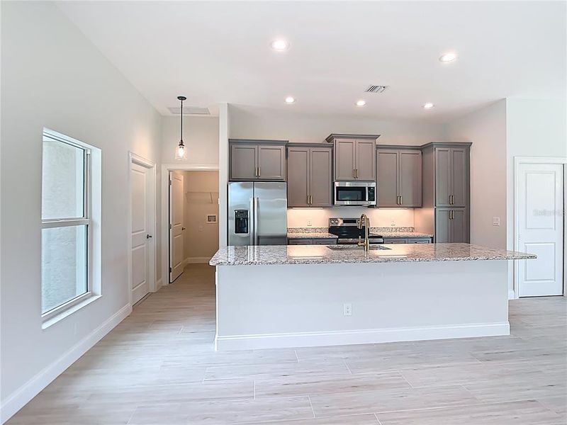 Furnished interior view inside a new home in , Port Charlotte (Image 10).