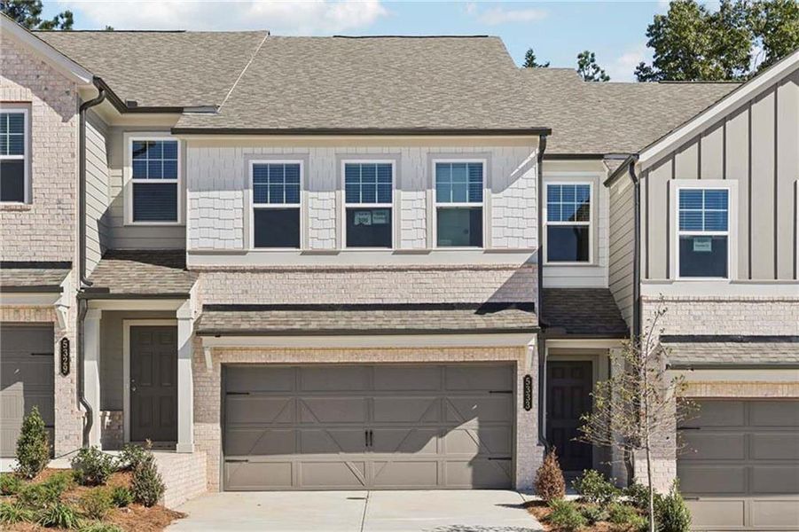 Front exterior of a new home in Eastlyn Crossing, Flowery Branch, GA, highlighting curb appeal (Image 19).