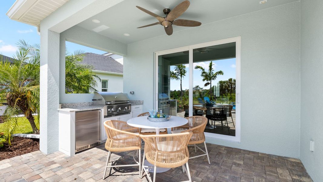 Exterior details and patio area of a home in Palmera Real Estate and Homes for Sale in Venice, FL - Neal Communities, Venice (Image 22). Exterior details and patio area of a home in Palmera Real Estate and Homes for Sale in Venice, FL - Neal Communities, Venice (Image 22).