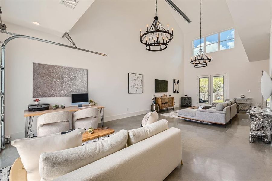 Dramatic high ceilings, open floor plan and beautiful chandeliers!