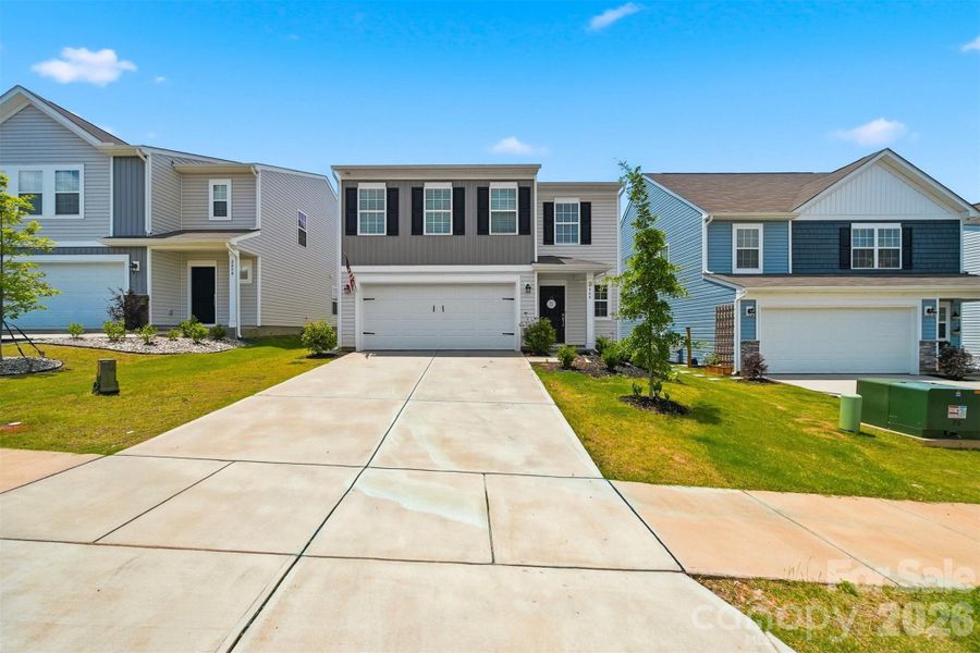 Front exterior of a new home in Legacy Ridge, Catawba, NC, highlighting curb appeal (Image 23). Front exterior of a new home in Legacy Ridge, Catawba, NC, highlighting curb appeal (Image 23).