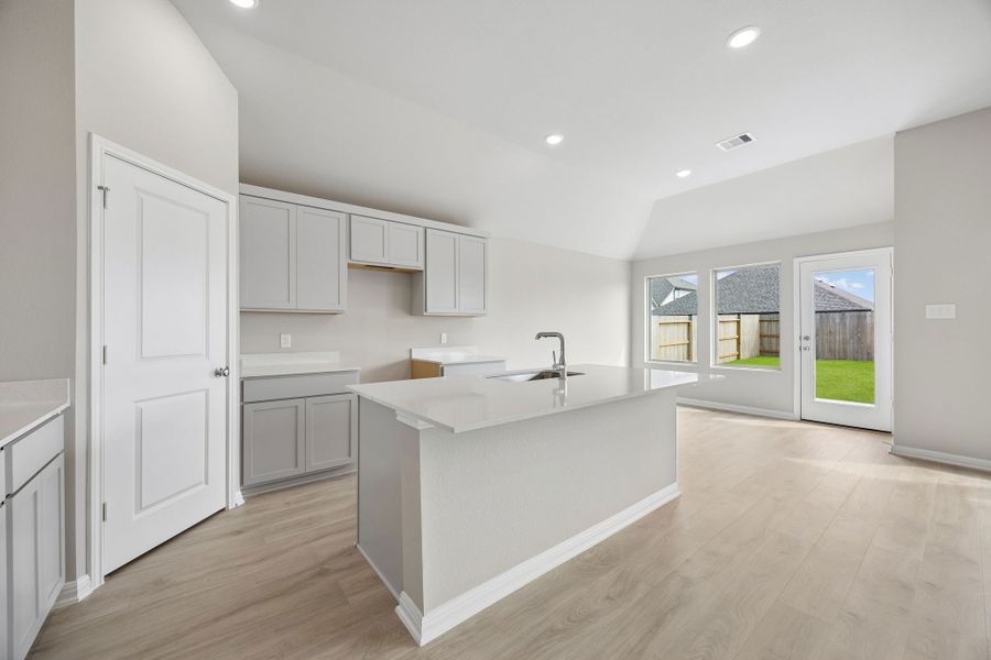 Furnished interior view inside a new home in Riviera Pines, Huffman (Image 6).