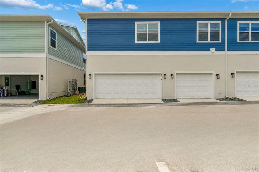 Front exterior of a new home in , Orlando, FL, highlighting curb appeal (Image 24).