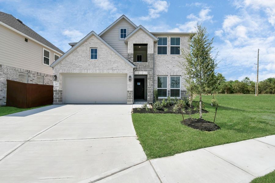 Home features a convenient 2-car garage complemented by a spacious driveway, offering ample parking for you and your guests. Home features a convenient 2-car garage complemented by a spacious driveway, offering ample parking for you and your guests.