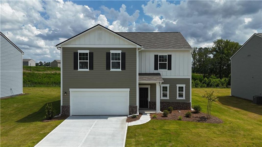 Front exterior of a new home in Casteel, Bethlehem, GA, highlighting curb appeal (Image 1). Front exterior of a new home in Casteel, Bethlehem, GA, highlighting curb appeal (Image 1).