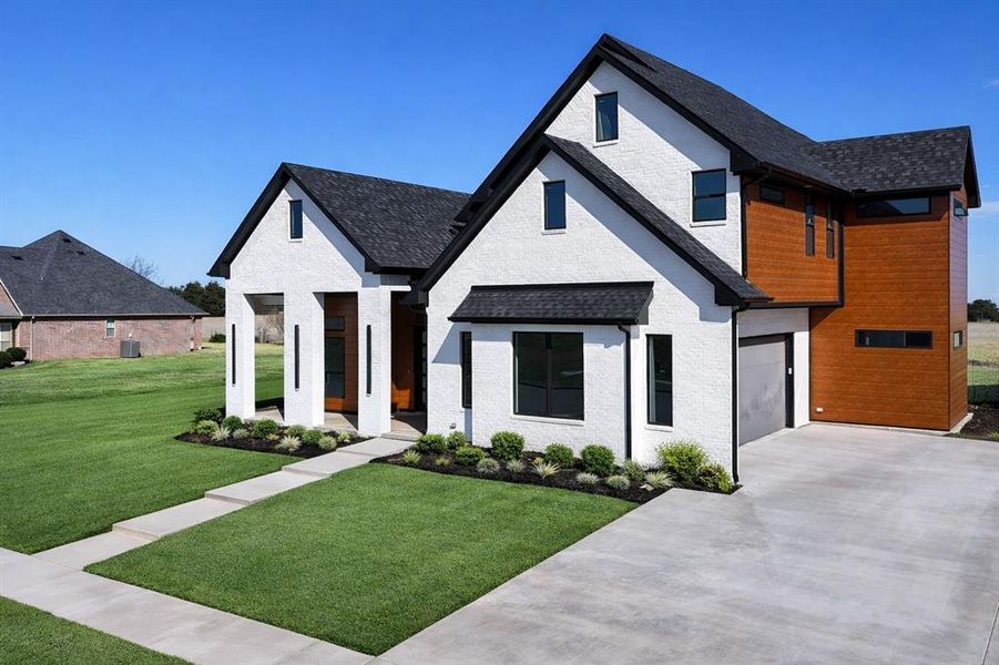 Front exterior of a new home in , Pottsboro, TX, highlighting curb appeal (Image 28). Front exterior of a new home in , Pottsboro, TX, highlighting curb appeal (Image 28).