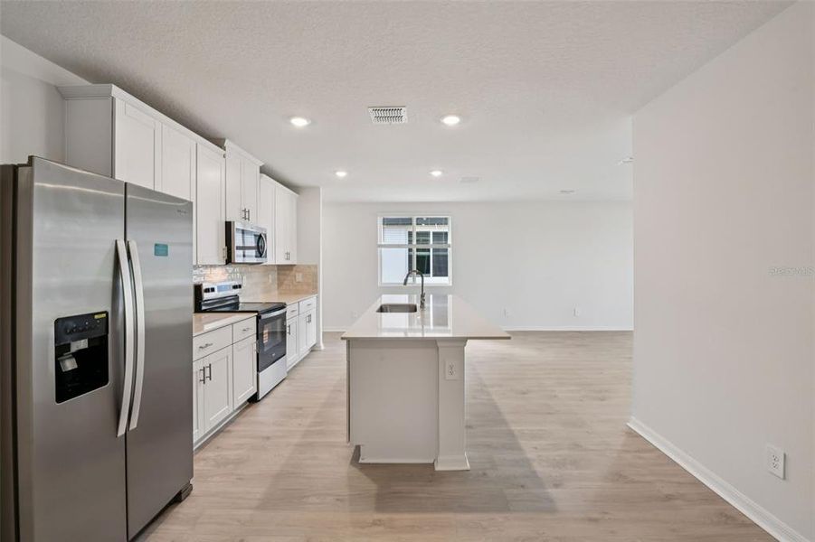 Furnished interior view inside a new home in Ridgehaven - Villas, Ormond Beach (Image 9).
