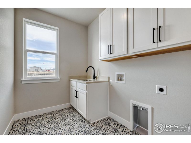 Furnished interior view inside a new home in Barefoot Lakes, Firestone (Image 12).