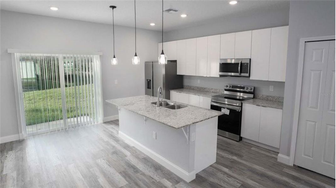 Furnished interior view inside a new home in , Dunnellon (Image 5).