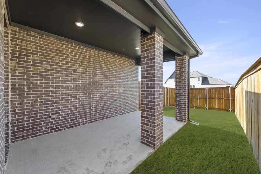 Exterior details and patio area of a home in Hillside Village 40s, Celina (Image 3).