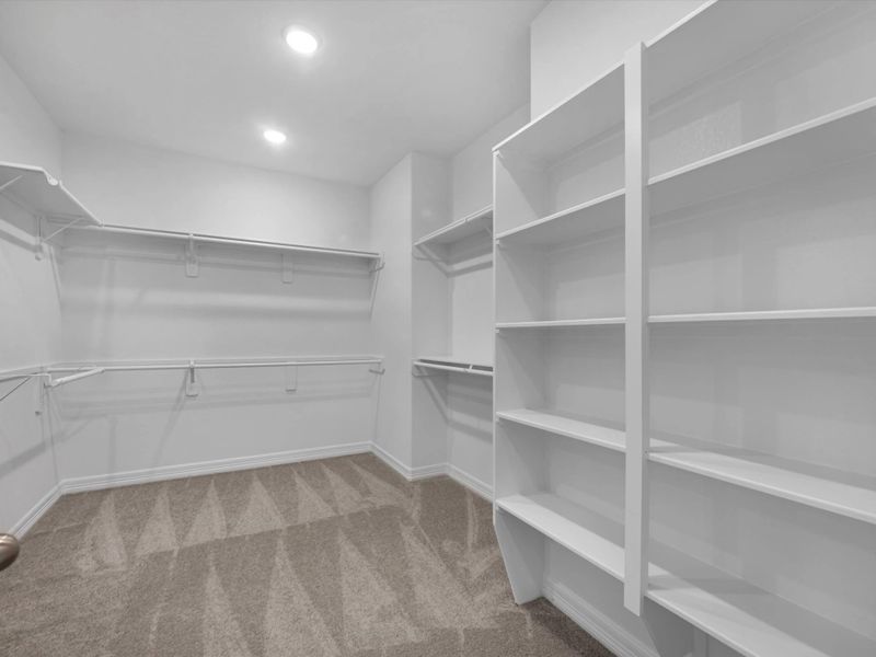 Primary closet. Sample product photo. Actual exterior and interior selections may vary by homesite. Photo may be virtually staged. Primary closet. Sample product photo. Actual exterior and interior selections may vary by homesite. Photo may be virtually staged.