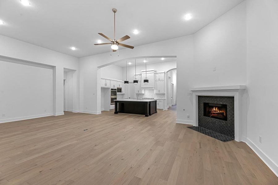 View of the family room from the back of the home. Look at the abundance of entertaining space! View of the family room from the back of the home. Look at the abundance of entertaining space!