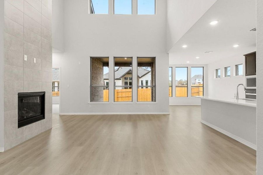 Family room soaring ceiling and  plenty natural light